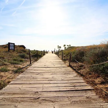 Global Properties, Nuevo En La Playa De Apartment